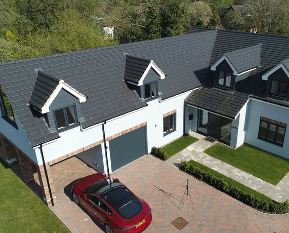 Use a drone for aerial photographs of properties for sale